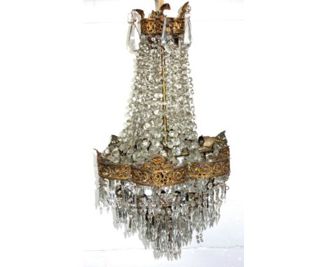 Late 19th Century gilt brass hexafoil 5 light chandelier with pierced scroll and floral decoration, with cut glass bead swags