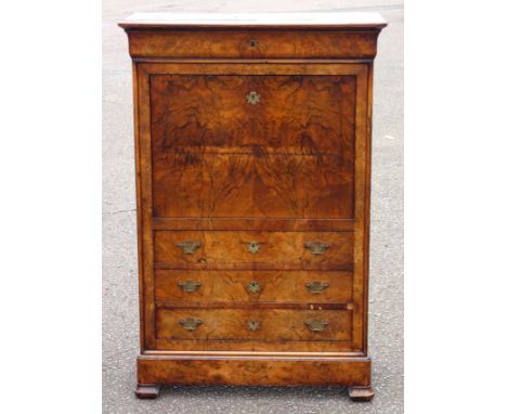 19th Century Continental figured walnut escritoire a abattant with a frieze drawer and a fall front disclosing a shelf and 6 