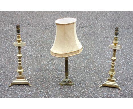 Pair of Italian brass candlesticks, each with a baluster column, on a triangular base, adapted to a table lamp, H.44.5cm, and