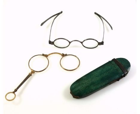 Pair of George IV silver framed spectacles with oval lenses and Ayscough type folding arms, by F H?, London, 1826, in a shagr