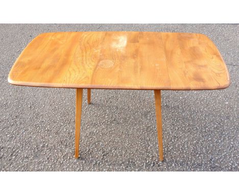 Ercol Windsor light elm drop leaf dining table with a rounded rectangular top and splayed square section legs, 71 x 61 x 74.5