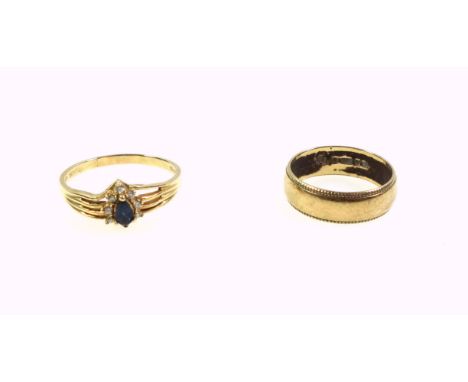 9ct gold wedding ring with bead borders, by R J, London, 1978, and a foreign 9ct gold ring with pierced shoulders set sapphir