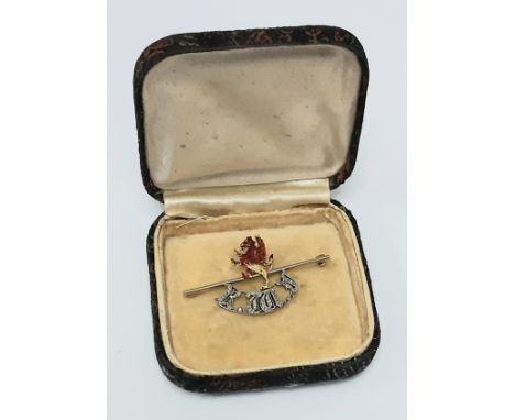 Royal Welsh Fusiliers yellow metal brooch, possibly 14ct (untested), with the pierced initials R. W. F highlighted by inset r
