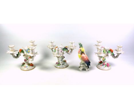 Pair of Dresden porcelain 3 branch candelbra, each with floral encrusted and gilt rococo scroll and foliate decoration, H.17c