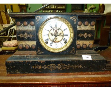 A metal cased Mantle Clock being of the appearance of a marble clock, 17'' long x 10'' high, a/f.