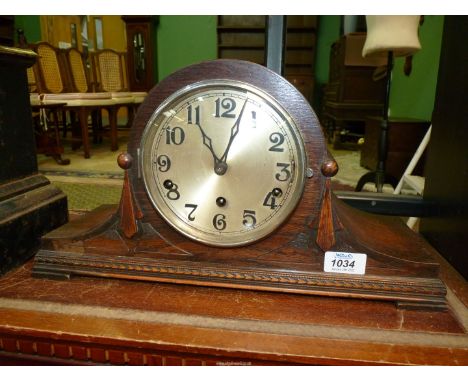 A Westminster chiming mantle Clock in Napoleon shape, (key absent).