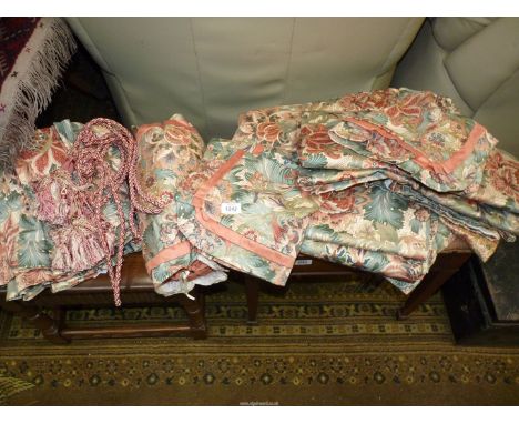 A pair of lined Curtains in a terracotta and muted blue floral pattern, 76'' wide x 72'' drop with matching pelmet, pillowsha