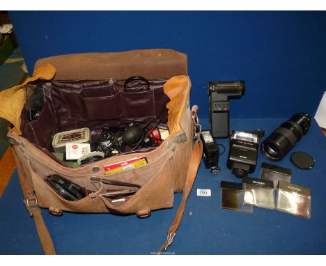 A Large Leather Camera outfit Bag containing a qty of Photographic Equipment including a Vivitar 75-260mm f/4.5 Zoom Lens in 