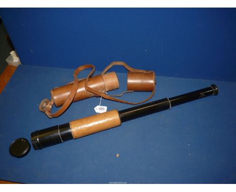 A three draw aluminium Telescope by Ross of London with a 6cm diameter lens, leather coated and in leather case, with date to