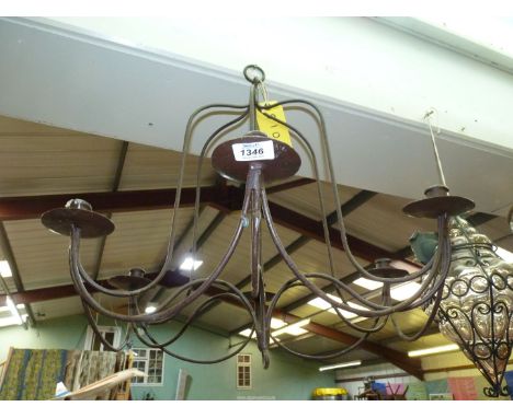 A six branch metal candelabra.