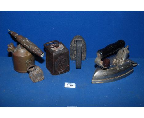A vintage Hotpoint electric iron (no flex), old Bell &amp; Co. flat iron, two weights and a  brass blow lamp, a/f.