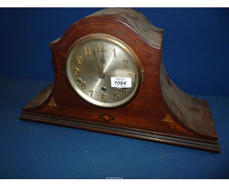 A Napoleon hat shaped Mahogany Mantel clock, some marquetry missing, no key or pendulum present, 19" long x 11" tall.