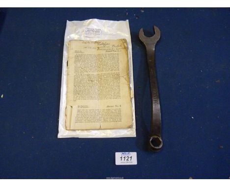 An original Model T Ford owners issue spanner together with the first owners handbook with his name and address written in in