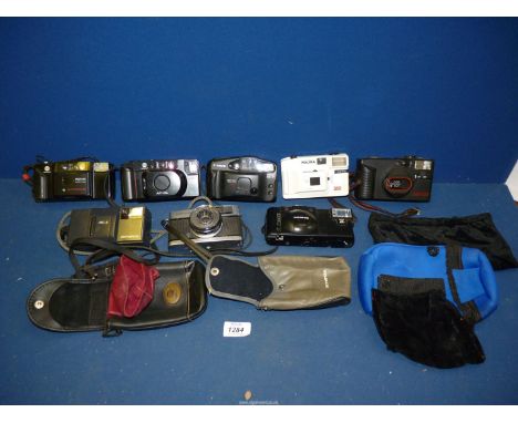 A qty of 35mm Compact Cameras inc an Olympus XA 3 with A11 Flash, an Olympus AF-1 with Zuiko 35mm f/2.8 Lens, an Olympus Trip