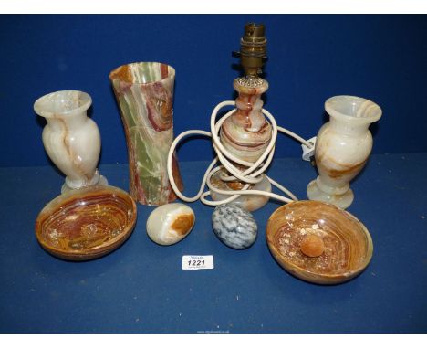 A quantity of stone/onyx to include; table lamp, vases, dishes, etc.