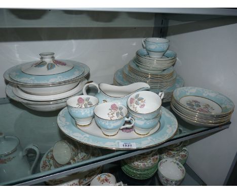 A quantity of Imperial 'Jasper Rose' tea and dinner ware in light blue with pink flowers to include two lidded tureens, five 