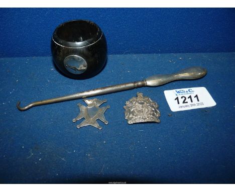 A small quantity of silver items including button Hook with silver handle, Birmingham, a silver badge, ebony pot with small c