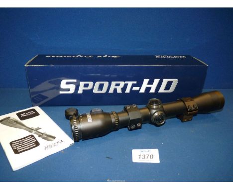 A boxed Hawke Sport-HD cross-hair type Rifle-scope HK3004 4 x 32 mil-dot. Apparently waterproof, shockproof and fog-proof, wi