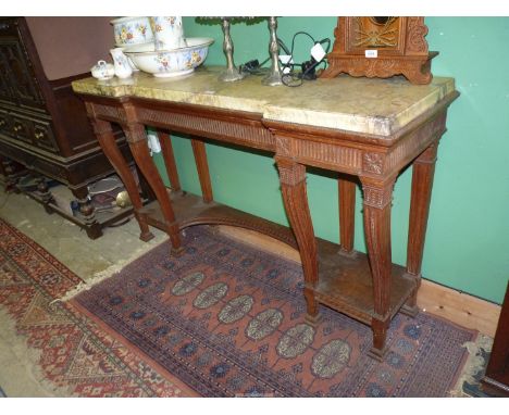 A superb quality Console table having carved and shaped front legs, a fluted frieze, a bow-backed central recess and with an 