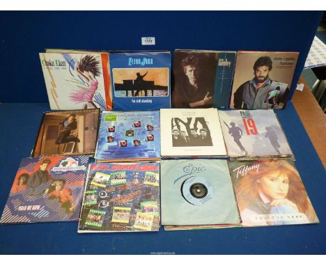 A large quantity of 45 rpm records including Bruce Springsteen, Lionel Richie, Spandau Ballet, Madonna, Sting, Pet Shop Boys,