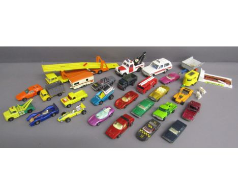 Die-cast cars includes - Dinky Rescue Land Rover - Dinky police Range Rover - Matchbox transporter - Lesney - etc