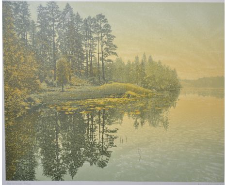 A signed lithograph print by Kenneth Leech entitled Fir Island. The print depicting lake and forest scene being framed and gl