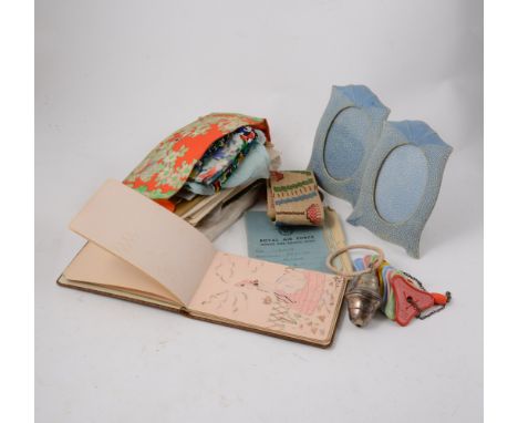 A box of ephemera and vintage items to include silk handkerchiefs, bead purses, a pair of photograph frames, two babies rattl