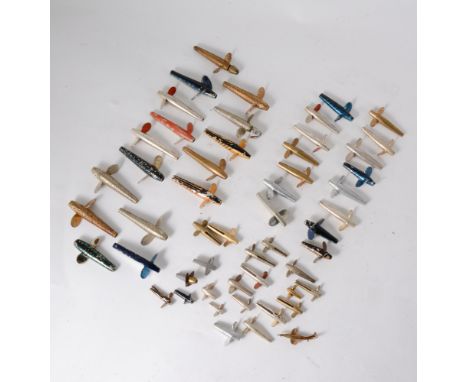 A quantity of vintage finshing Devon lures, including; two Hardy 2 1/2" spinning heads,; Hardy Pennells (including left hande