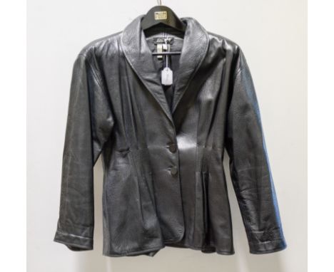 Jean Muir London - a black leather jacket, pleated nipped in darted waist with centre back seam, collar to front, two circula