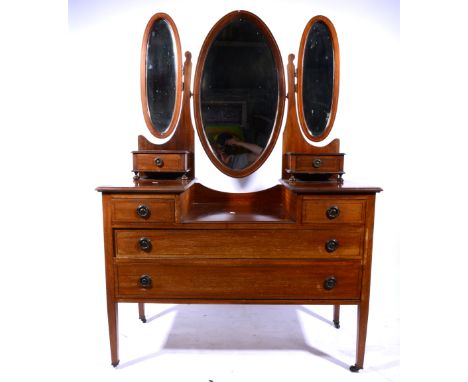 Edwardian inlaid mahogany dressing table, triple mirror back, two-ways trinket drawers, four drawers under, width 114cms;