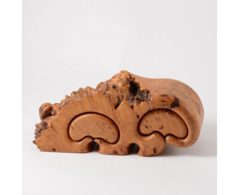 A contemporary craft Maple Burl carving, cut with two trinket drawers.