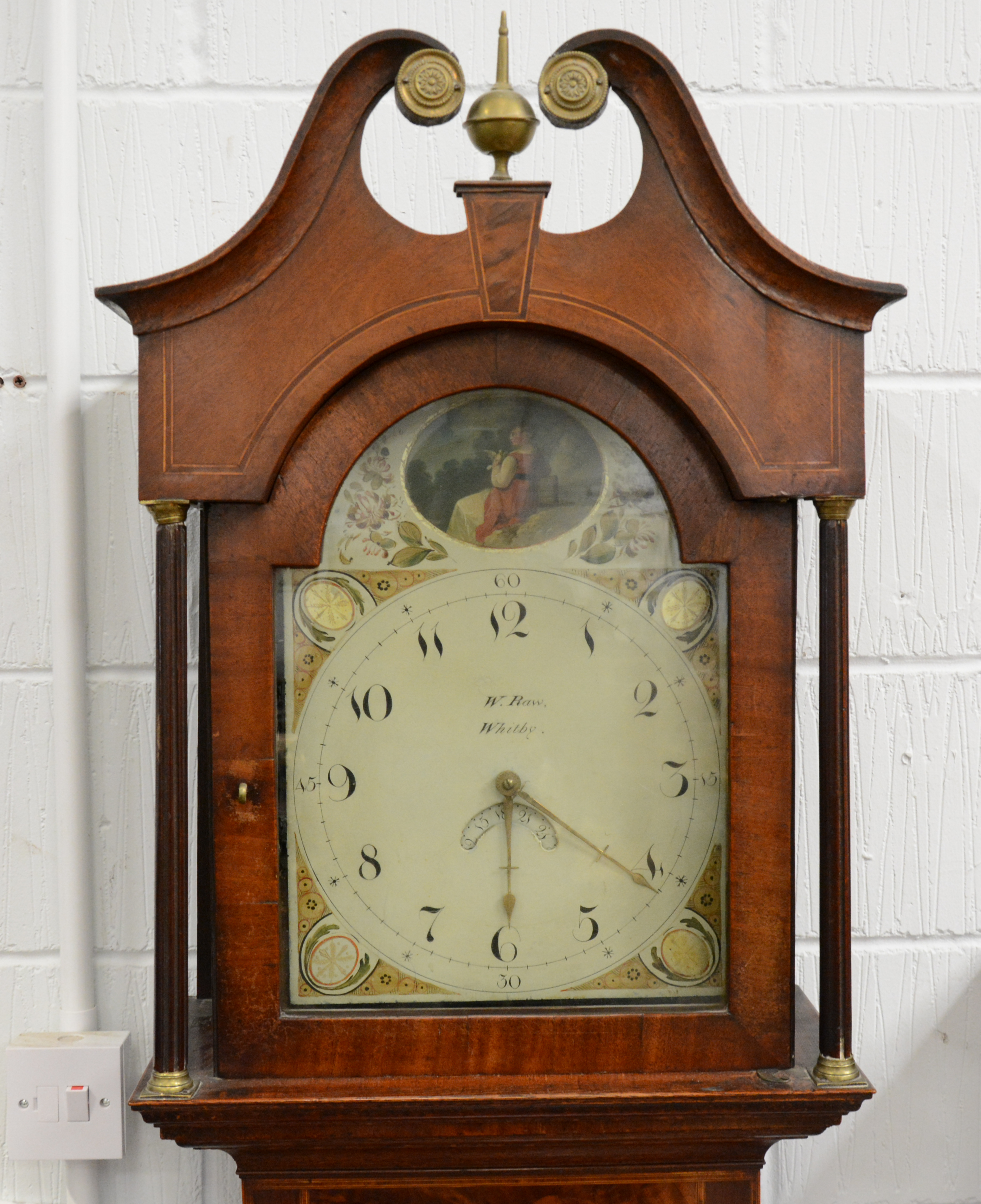 Open mahogany longcase clock, hood with a swanneck pediment, turned