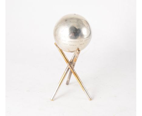 Silver presentation bowling jack, Thomas Ross & Sons, Glasgow 1952, engraved Fossilpark bowling Club, on a plated tripod stan
