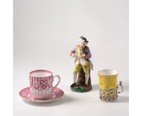 A Belleek porcelain woven basket with applied flower heads, a Belleek cup and saucer, blue backstamp, cabinet cups and saucer