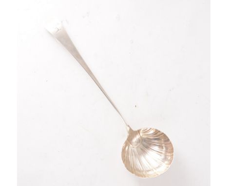 A George III silver soup ladle, fluted bowl, hallmarked London 1770, crested to top, 32cm long, approximate weight 4oz.