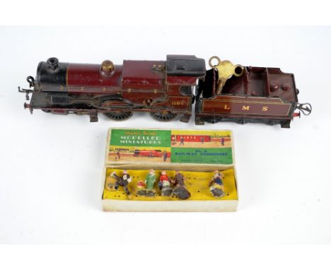A Meccano Hornby clockwork O-gauge tin plate playworn engine and tender, in MLS livery, engine no.1185, with key, and a colle