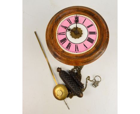A c.1900 Post Office alarm wall clock with stained beech case, twin weights and pendulum, diameter 26.5cm.
