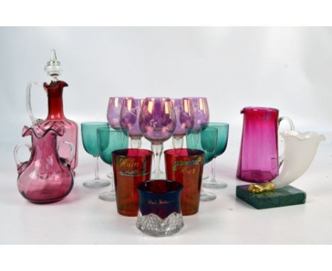 A set of six clear and ruby tinted floral cut wine glasses, a ewer, height 28.5cm including finial, etc, a set of four green 