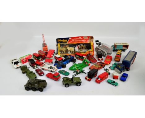 A small quantity of playworn toys including a Dinky Cinderella's coach in blister pack, Ertl tractor, various racing cars, et