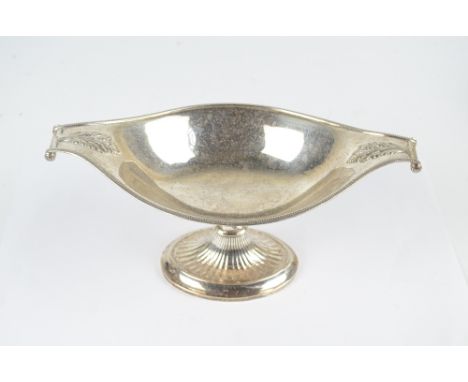 HARRISON BROS & HOWSON; a George V hallmarked silver navette shaped comport with acanthus decorated scrolling ends and fluted