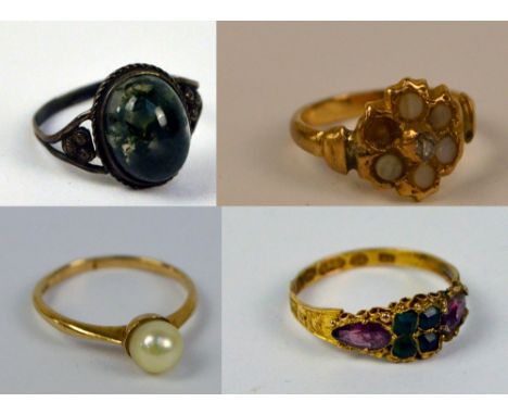 A 15ct yellow gold dress ring set with green and amethyst coloured faceted stones, hallmarked for Birmingham 1895, size O, a 