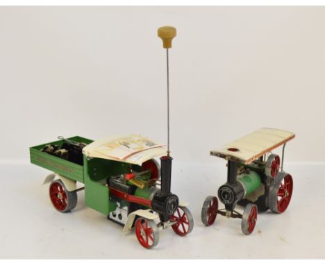A Mamod steam wagon and steam tractor (af) (2).   CONDITION REPORT:  Postage cost within UK would be £22.50 + VAT.