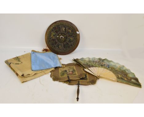 A Victorian bead work circular footstool, a painted mother of pearl fan, two face screens (af), an embroidery and a painted h