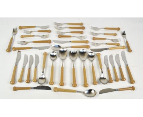 A set of Denby "Regency" ceramic handled cutlery and flat ware in pale brown colour comprising five dinner knives, six dinner