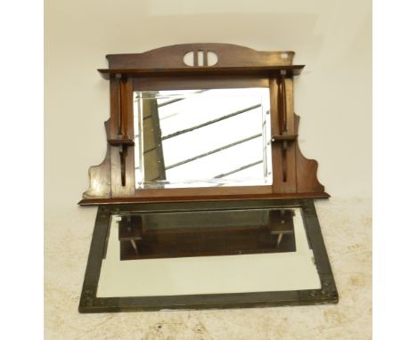 An Arts and Crafts bevelled rectangular wall mirror with hammered frame embossed and engraved with fruits to the corners, 85 
