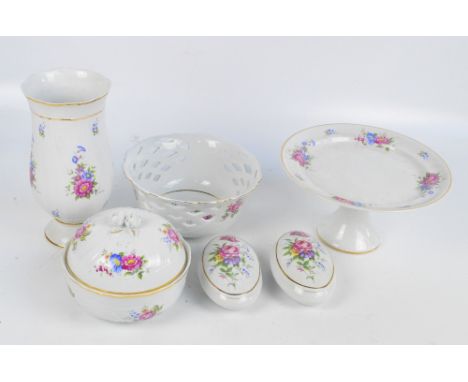 A group of Hungarian Hollóháza porcelain comprising a pierced circular floral decorated "Classic Collection" bowl, a circular