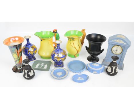 A small group of ceramics to include Wedgwood jasperware items (a timepiece, pin dish, etc), two Burleigh ware jugs with parr