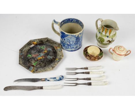 An 18th century Wheeldon sponge decorated octagonal plate, a Prattware jug decorated with a hunting scene, a blue and white d