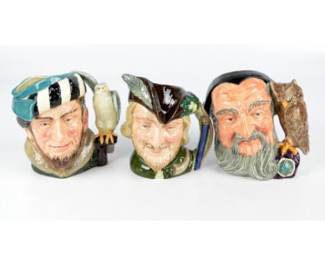 Three Royal Doulton character jugs; D6529 "Merlin", D6533 "The Falconer" and D6527 "Robin Hood" (3).   CONDITION REPORT:  GEn