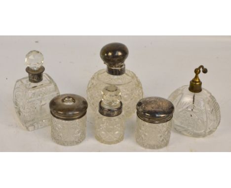 A group of various hallmarked silver mounted clear cut glass dressing table items including a cylindrical jar and a matching 